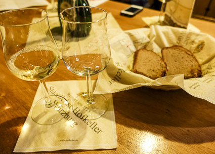 Wne glasses and bread in Staatlicher Hofkeller, Würzburg