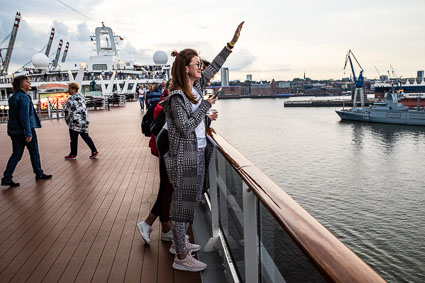 Passengers waving good-bye from MSC PREZIOSA