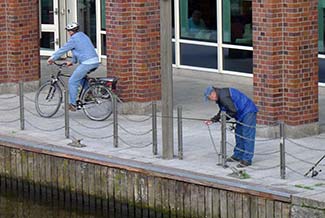 Alsterfleet walking path with fisherman