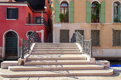 Bridge with wrought iron railing, Vencie, Italy