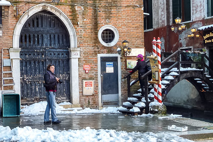 Snow on a Venice bridge