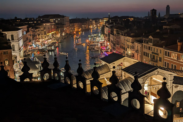 Grand Canal at night from Fondaco dei Tedeschi's roof terrace in Venice, Italy.