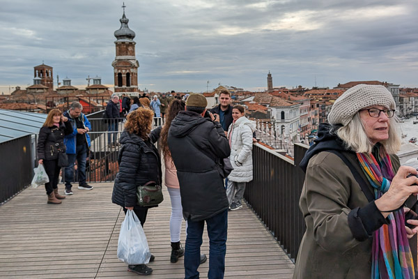 People on roof terrace of Fondaco dei Tedeschi, Venice.